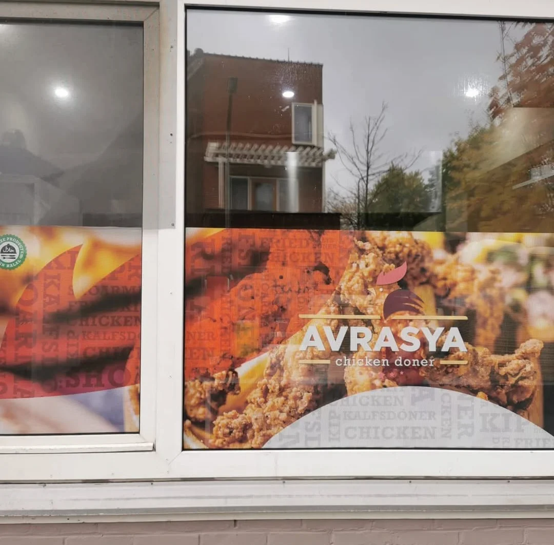 Bedrijfsbelettering winkelpand Nederland
